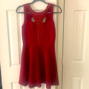 M red dress with bronze accents